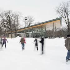 people skating on an outdoor rink